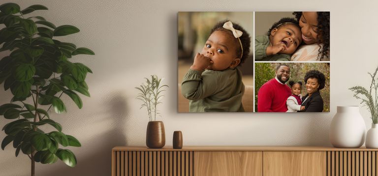 A photo collage canvas of a baby and her family hangs on the wall.