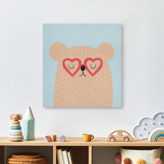 A framed print displaying a child's drawing.